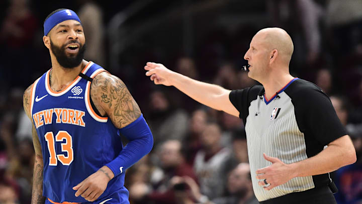 Feb 3, 2020; Cleveland, Ohio, USA; New York Knicks forward Marcus Morris Sr. (13) celebrates as referee Eric Dalen signals a three point basket during overtime against the Cleveland Cavaliers at Rocket Mortgage FieldHouse. Mandatory Credit: Ken Blaze-Imagn Images Feb 3, 2020; Cleveland, Ohio, USA; New York Knicks forward Marcus Morris Sr. (13) celebrates as referee Eric Dalen signals a three point basket during overtime against the Cleveland Cavaliers at Rocket Mortgage FieldHouse. Mandatory Credit: Ken Blaze-Imagn Images