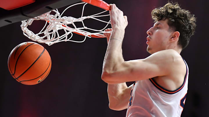Mar 3, 2026; Champaign, Illinois, USA; Illinois Fighting Illini forward Zvonimir Ivisic (44) dunks during the first half against the Oregon Ducks at State Farm Center. Mandatory Credit: Ron Johnson-Imagn Images Mar 3, 2026; Champaign, Illinois, USA; Illinois Fighting Illini forward Zvonimir Ivisic (44) dunks during the first half against the Oregon Ducks at State Farm Center. Mandatory Credit: Ron Johnson-Imagn Images