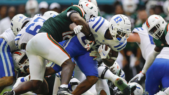 Oct 22, 2022; Miami Gardens, Florida, USA; Duke Blue Devils running back Terry Moore (23) runs with the football during the third quarter against the Miami Hurricanes at Hard Rock Stadium. Mandatory Credit: Sam Navarro-Imagn Images