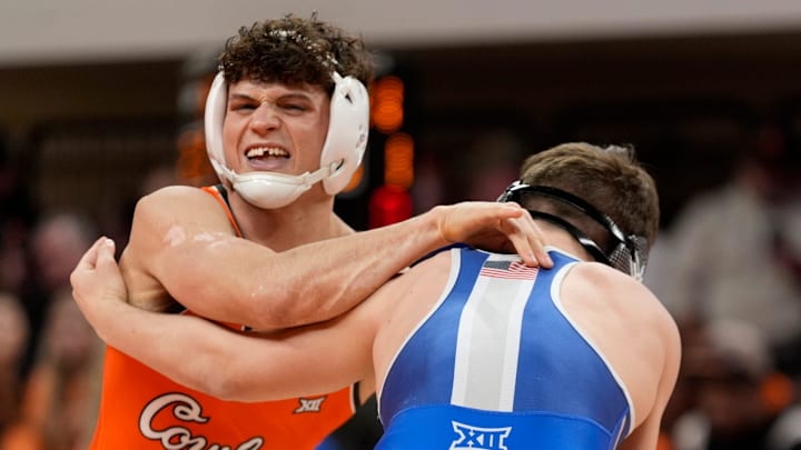 Oklahoma State's Tagen Jamison reacts as he wrestles Carter Nogle in the 141-pound match during the college wrestling dual between Oklahoma State and Air Force at Gallagher-Iba Arena in Stillwater, Okla., Friday, Jan., 3, 2025.