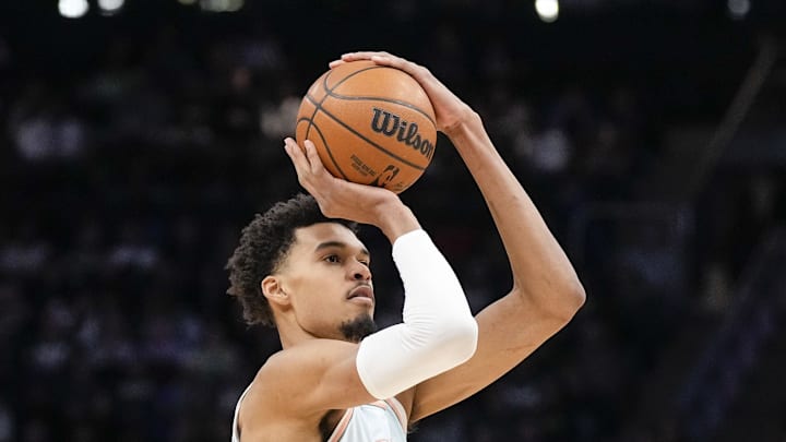 San Antonio Spurs forward Victor Wembanyama shoots during the first quarter against the Milwaukee Bucks at Fiserv Forum on January 8, 2025.