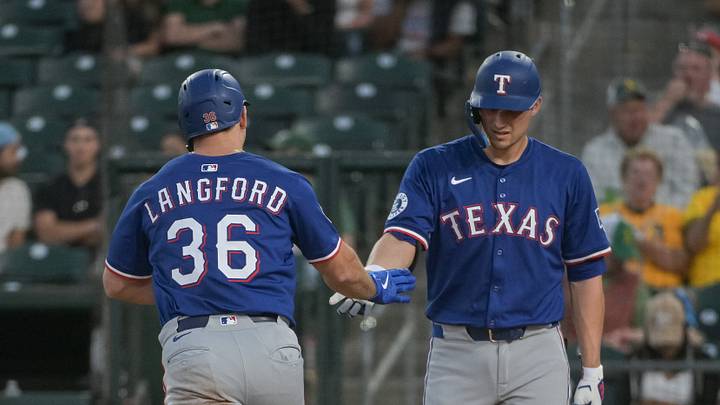 Apr 22, 2025; West Sacramento, California, USA; Texas Rangers outfielder Wyatt Langford (36) celebrates with shortstop Corey Seager (5) after hitting a home run against the Athletics during the third inning at Sutter Health Park. Mandatory Credit: Ed Szczepanski-Imagn Images Apr 22, 2025; West Sacramento, California, USA; Texas Rangers outfielder Wyatt Langford (36) celebrates with shortstop Corey Seager (5) after hitting a home run against the Athletics during the third inning at Sutter Health Park. Mandatory Credit: Ed Szczepanski-Imagn Images