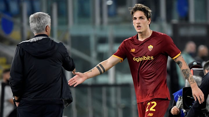 Jose Mourinho coach of AS Roma greets Nicolo Zaniolo of AS...