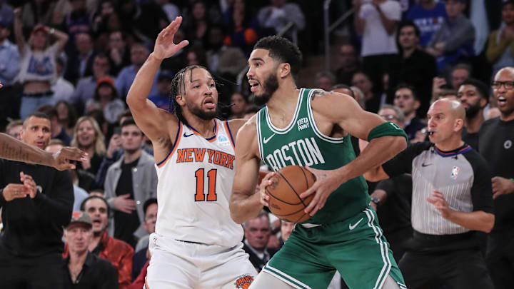 Oct 25, 2023; New York, New York, USA; Boston Celtics forward Jayson Tatum (0) is guarded by New York Knicks guard Jalen Brunson (11) while trying to make a pass in the fourth quarter at Madison Square Garden. Mandatory Credit: Wendell Cruz-USA TODAY Sports