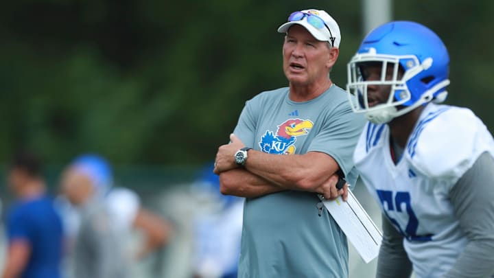 Kansas coach Lance Leipold watches players during practice at the outdoor practice fields in Lawrence on July 24, 2025.