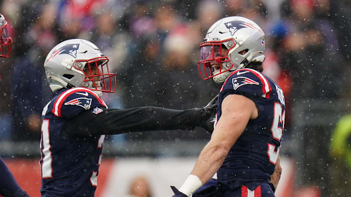 Dec 14, 2025; Foxborough, Massachusetts, USA; New England Patriots linebacker Jack Gibbens (51) and safety Craig Woodson (31) react after a play against the Buffalo Bills in the first half at Gillette Stadium. Mandatory Credit: David Butler II-Imagn Images