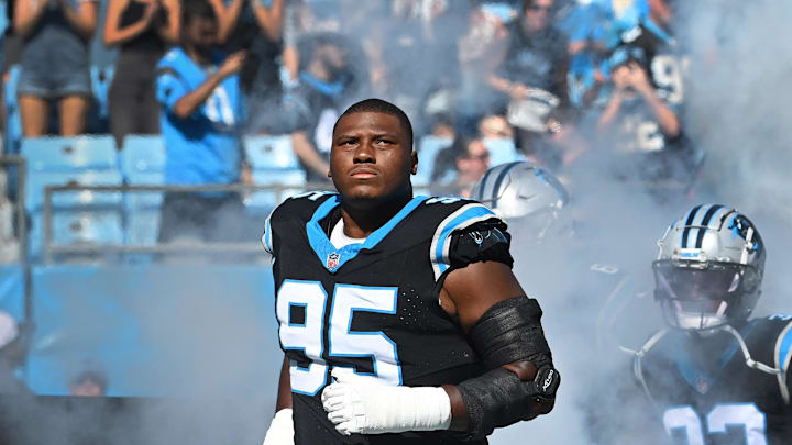 Oct 29, 2023; Charlotte, North Carolina, USA; Carolina Panthers defensive tackle Derrick Brown (95) runs on to the field at Bank of America Stadium. Mandatory Credit: Bob Donnan-Imagn Images