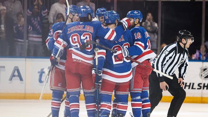 Apr 5, 2026; New York, New York, USA; New York Rangers defenseman Adam Fox (23) celebrates his goal against the Washington Capitals during the second period at Madison Square Garden.