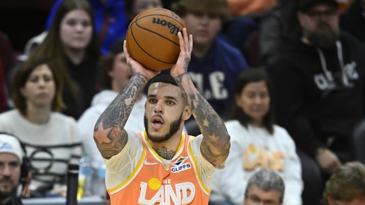 Nov 17, 2025; Cleveland, Ohio, USA; Cleveland Cavaliers guard Lonzo Ball (2) shoots in the third quarter against the Milwaukee Bucks at Rocket Arena. Mandatory Credit: David Richard-Imagn Images