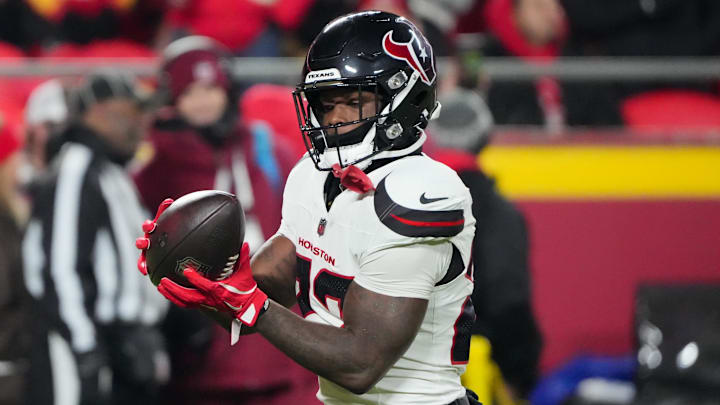 Houston Texans running back Woody Marks (27) warms up prior to the game against the Kansas City Chiefs at GEHA Field at Arrowhead Stadium. Houston Texans running back Woody Marks (27) warms up prior to the game against the Kansas City Chiefs at GEHA Field at Arrowhead Stadium.