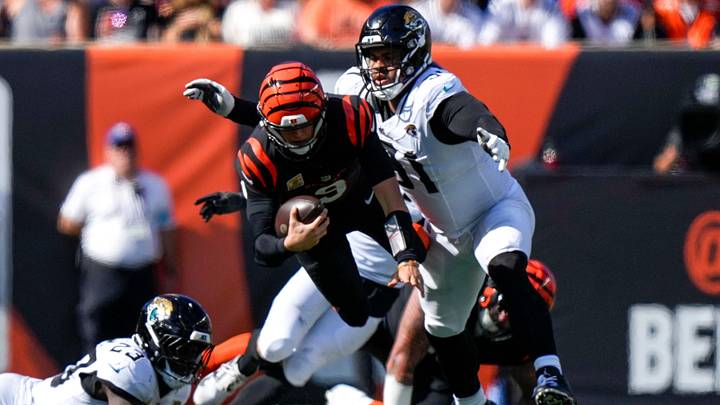 Cincinnati Bengals quarterback Joe Burrow (9) scrambles before being brought down on a play in the third quarter of the NFL Week 4 game between the Cincinnati Bengals and the Jacksonville Jaguars at Paycor Stadium in Cincinnati on Sunday, Oct. 4, 2026. The Bengals fell to 2-2 on the season with a 22-17 loss at home. Cincinnati Bengals quarterback Joe Burrow (9) scrambles before being brought down on a play in the third quarter of the NFL Week 4 game between the Cincinnati Bengals and the Jacksonville Jaguars at Paycor Stadium in Cincinnati on Sunday, Oct. 4, 2026. The Bengals fell to 2-2 on the season with a 22-17 loss at home.