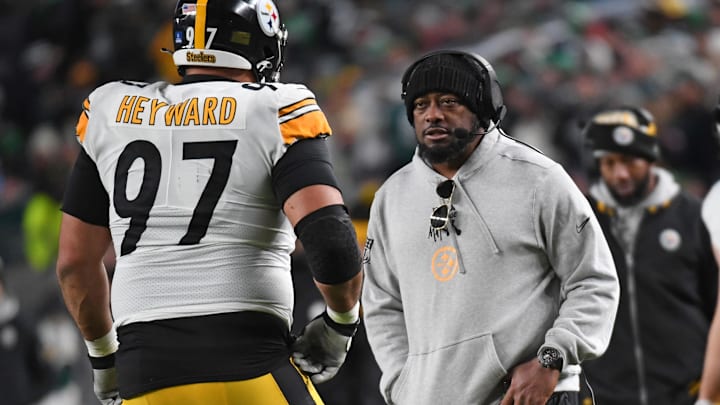 Dec 15, 2024; Philadelphia, Pennsylvania, USA; Pittsburgh Steelers head c coach Mike Tomlin talks with Pittsburgh Steelers defensive tackle Cameron Heyward (97) against the Philadelphia Eagles during the second quarter at Lincoln Financial Field. Mandatory Credit: Eric Hartline-Imagn Images