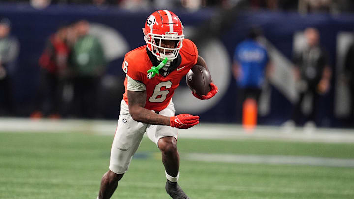 Dec 7, 2024; Atlanta, GA, USA; Georgia Bulldogs wide receiver Dominic Lovett (6) makes a catch against the Texas Longhorns during the second half in the 2024 SEC Championship game at Mercedes-Benz Stadium. Mandatory Credit: Dale Zanine-Imagn Images