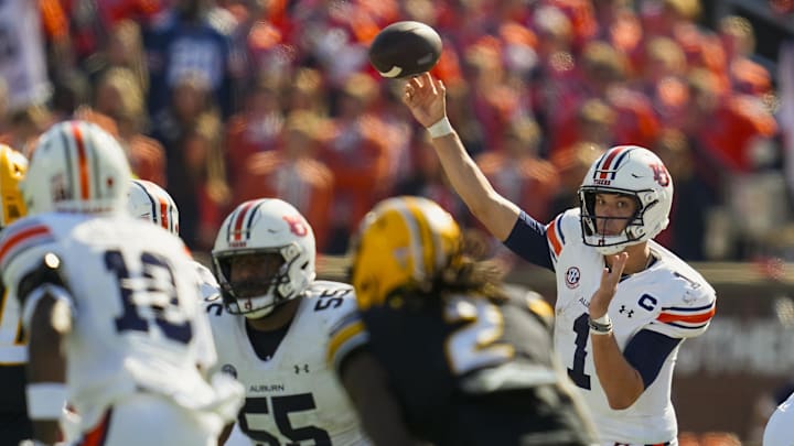 Oct 19, 2024; Columbia, Missouri, USA; Auburn Tigers quarterback Payton Thorne (1) throws a pass during the second half against the Missouri Tigers at Faurot Field at Memorial Stadium. Mandatory Credit: Jay Biggerstaff-Imagn Images