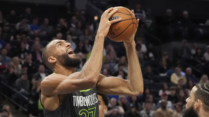 Mar 28, 2025; Minneapolis, Minnesota, USA; Minnesota Timberwolves center Rudy Gobert (27) goes to the basket against the Phoenix Suns in the second quarter at Target Center. Mandatory Credit: Bruce Kluckhohn-Imagn Images