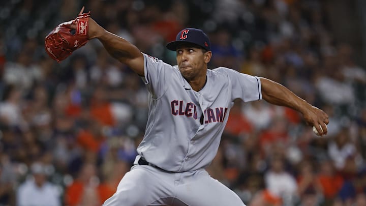 May 24, 2022; Houston, Texas, USA; Cleveland Guardians relief pitcher Anthony Gose (26) pitches during the game against the Houston Astros at Minute Maid Park.