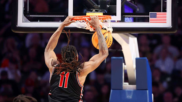Nov 16, 2025; Birmingham, Alabama, USA; Houston Cougars forward Joseph Tugler (11) dunks the ball during the second half against the Auburn Tigers at Legacy Arena at BJCC. Mandatory Credit: David Leong-Imagn Images