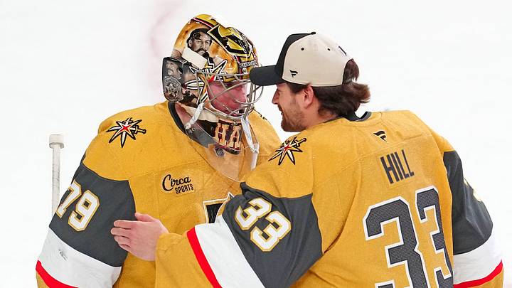 Apr 19, 2026; Las Vegas, Nevada, USA; Vegas Golden Knights goaltender Adin Hill (33) congratulates goaltender Carter Hart (79) after the Golden Knights defeated the Utah Mammoth 4-2 in game one of the first round of the 2026 Stanley Cup Playoffs at T-Mobile Arena. Mandatory Credit: Stephen R. Sylvanie-Imagn Images Apr 19, 2026; Las Vegas, Nevada, USA; Vegas Golden Knights goaltender Adin Hill (33) congratulates goaltender Carter Hart (79) after the Golden Knights defeated the Utah Mammoth 4-2 in game one of the first round of the 2026 Stanley Cup Playoffs at T-Mobile Arena. Mandatory Credit: Stephen R. Sylvanie-Imagn Images