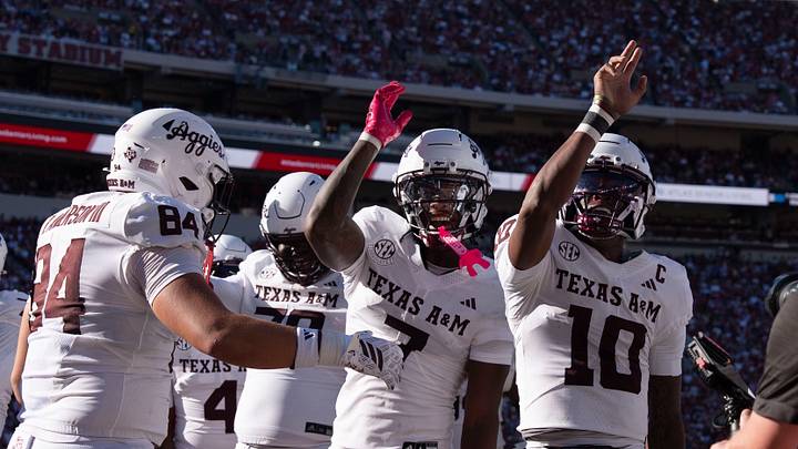 Oct 24, 2026; Tuscaloosa, AL, USA;  Texas A&M quarterback Marcel Reed (10) celebrates his running touchdown with teammates during the game with Alabama at Saban Field at Bryant Denny Stadium. Mandatory Credit: Gary Cosby Jr.-Tuscaloosa News