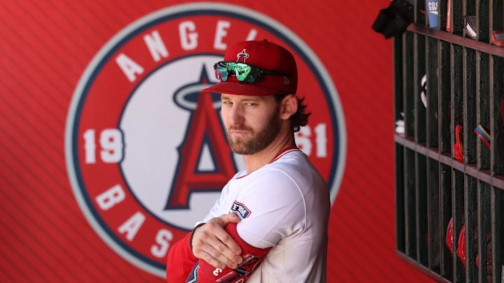 Sep 29, 2024; Anaheim, California, USA; Los Angeles Angels left fielder Taylor Ward (3) stands in a dugout during the ninth inning against the Texas Rangers at Angel Stadium. Mandatory Credit: Kiyoshi Mio-Imagn Images Sep 29, 2024; Anaheim, California, USA; Los Angeles Angels left fielder Taylor Ward (3) stands in a dugout during the ninth inning against the Texas Rangers at Angel Stadium. Mandatory Credit: Kiyoshi Mio-Imagn Images