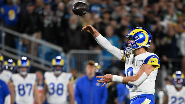 Jan 10, 2026; Charlotte, NC, USA; Los Angeles Rams quarterback Matthew Stafford (9) drops back to pass against the Carolina Panthers in the first half during the NFC Wild Card Round game at Bank of America Stadium. Mandatory Credit: Bob Donnan-Imagn Images