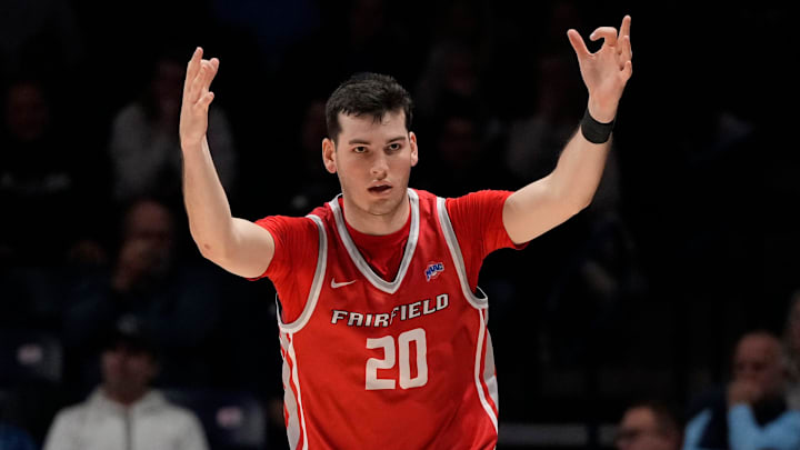 Fairfield Stags forward Zach Crisler (20) celebrates a three point basket in the first half of the