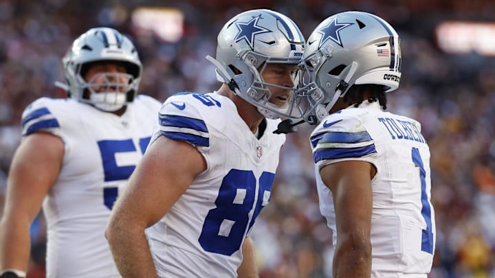 Dallas Cowboys wide receiver Jalen Tolbert celebrates with tight end Luke Schoonmaker after a touchdown against the Washington Commanders 