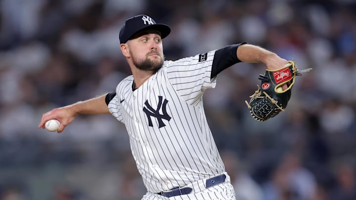 Jul 10, 2025; Bronx, New York, USA; New York Yankees relief pitcher JT Brubaker (34) pitches against the Seattle Mariners during the eighth inning at Yankee Stadium. Mandatory Credit: Brad Penner-Imagn Images