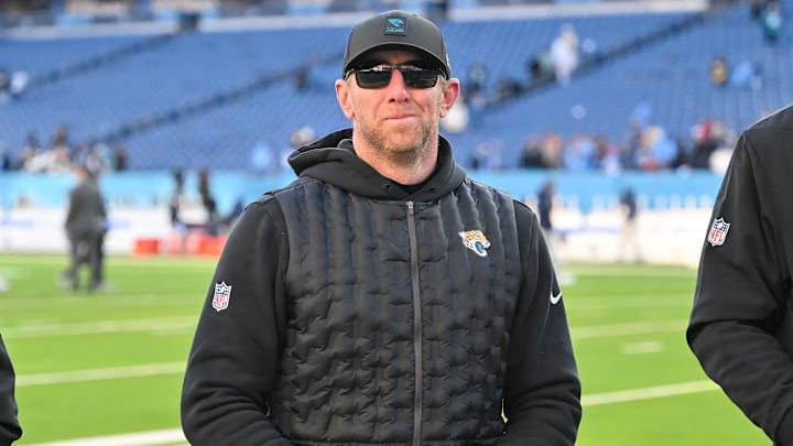 Nov 30, 2025; Nashville, Tennessee, USA;  Jacksonville Jaguars head coach Liam Coen smiles to the crowd as he walks of the field against the Tennessee Titans during the second half at Nissan Stadium. Mandatory Credit: Steve Roberts-Imagn Images