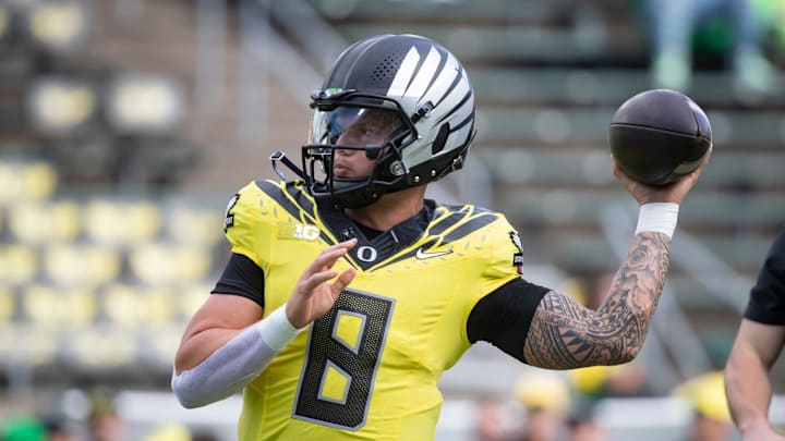 Oregon quarterback Dillon Gabriel throws a pass during warmups as the No. 1 Oregon Ducks host the No. 21 Illinois Fighting Illini Saturday, Oct. 26, 2024 at Autzen Stadium in Eugene, Ore.