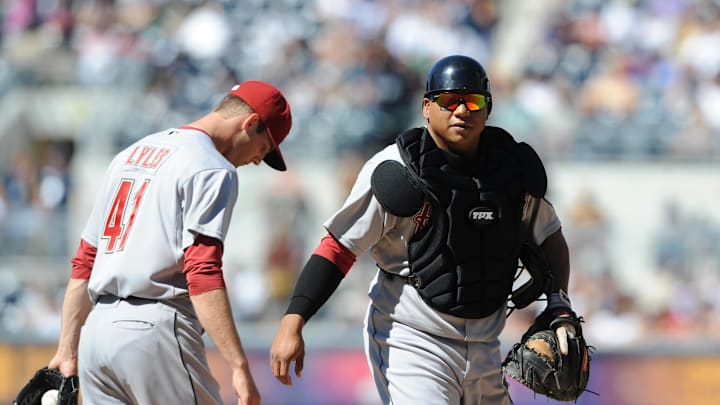 Houston Astros catcher Robinson Cancel (64) talks with starting pitcher Jordan Lyles (41) after giving up a run during the first inning against the San Diego Padres at Petco Park in 2011. Houston Astros catcher Robinson Cancel (64) talks with starting pitcher Jordan Lyles (41) after giving up a run during the first inning against the San Diego Padres at Petco Park in 2011.