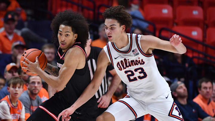 Jan 8, 2026; Champaign, Illinois, USA; Rutgers Scarlet Knights guard Lino Mark (2) takes the ball away from Fighting Illini guard Keaton Wagler (23) during the second half at State Farm Center. Mandatory Credit: Ron Johnson-Imagn Images Jan 8, 2026; Champaign, Illinois, USA; Rutgers Scarlet Knights guard Lino Mark (2) takes the ball away from Fighting Illini guard Keaton Wagler (23) during the second half at State Farm Center. Mandatory Credit: Ron Johnson-Imagn Images