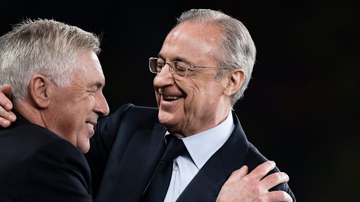 Florentino Perez (R), president of Real Madrid CF, hugs...