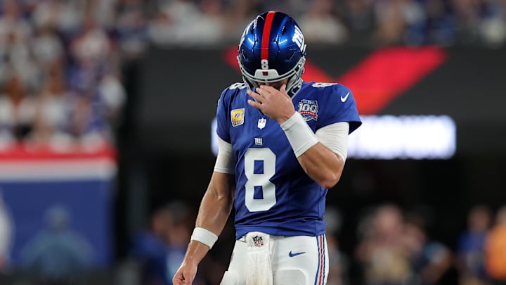 Sep 26, 2024; East Rutherford, New Jersey, USA; New York Giants quarterback Daniel Jones (8) reacts during the second quarter against the Dallas Cowboys at MetLife Stadium. Mandatory Credit: Brad Penner-Imagn Images