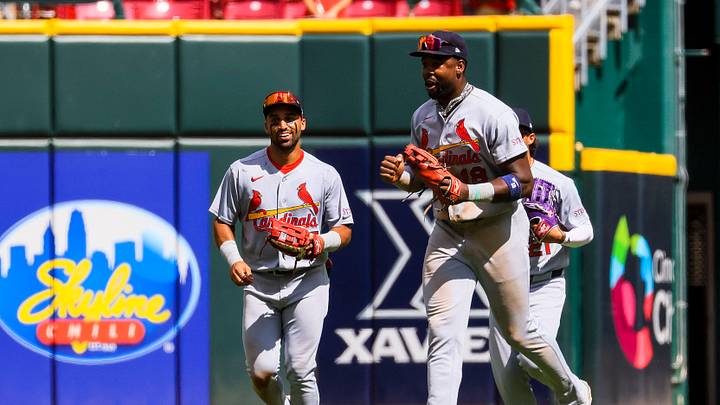 Aug 20, 2026; Cincinnati, Ohio, USA; St. Louis Cardinals outfielder Jordan Walker (18) and outfielder Jose Fermin (15) react after the victory over the Cincinnati Reds at Great American Ball Park. Mandatory Credit: Katie Stratman-Imagn Images