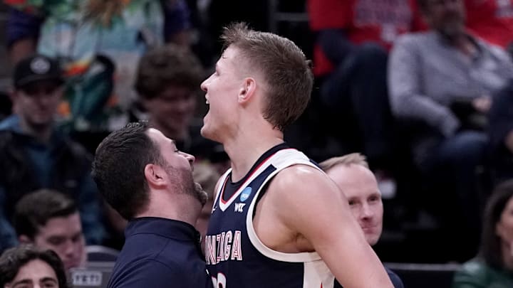 Mar 23, 2024; Salt Lake City, UT, USA; Gonzaga Bulldogs forward Ben Gregg (33) celebrates with staff