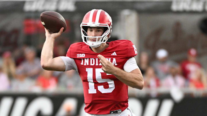 Indiana Hoosiers quarterback Fernando Mendoza (15) throws a pass during the first half against the Michigan State Spartans at Memorial Stadium. Indiana Hoosiers quarterback Fernando Mendoza (15) throws a pass during the first half against the Michigan State Spartans at Memorial Stadium.