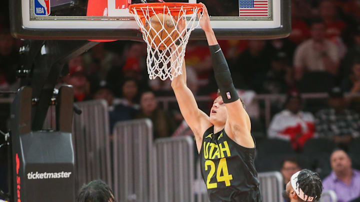 Feb 27, 2024; Atlanta, Georgia, USA; Utah Jazz center Walker Kessler (24) dunks against the Atlanta Hawks in the first quarter at State Farm Arena. Mandatory Credit: Brett Davis-Imagn Images