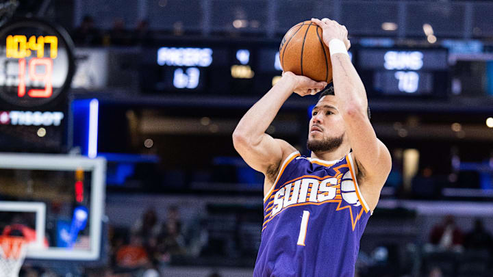 Devin Booker and the Suns are road underdogs in Toronto.