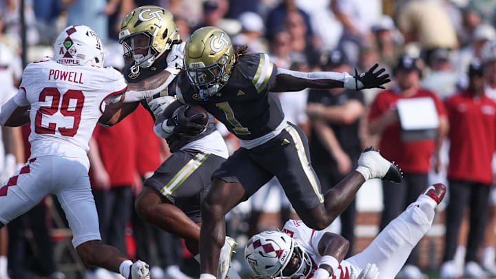 Sep 20, 2025; Atlanta, Georgia, USA; Georgia Tech Yellow Jackets running back Jamal Haynes (1) runs the ball against the Temple Owls in the first quarter at Bobby Dodd Stadium at Hyundai Field. Mandatory Credit: Brett Davis-Imagn Images
