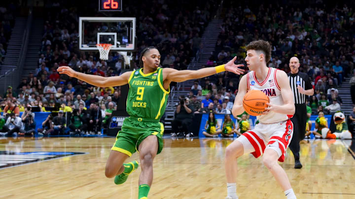 Mar 23, 2025; Seattle, WA, USA;  Arizona Wildcats guard Anthony Dell'Orso (3) controls the ball against Oregon Ducks guard Keeshawn Barthelemy (9) in the second half at Climate Pledge Arena. Mandatory Credit: Steven Bisig-Imagn Images