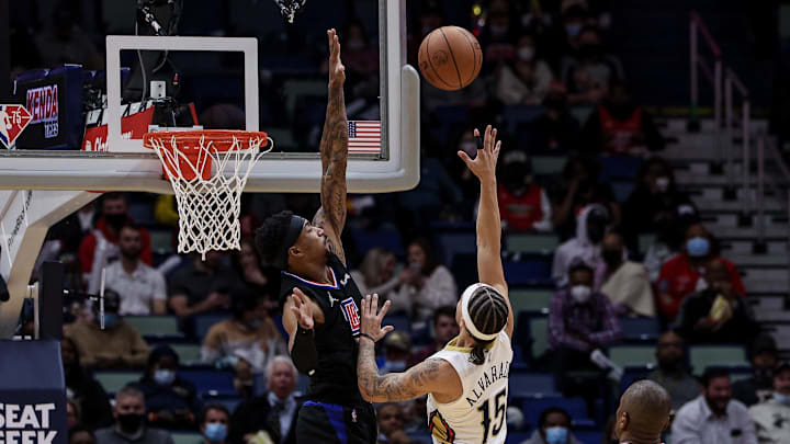 New Orleans Pelicans guard Jose Alvarado (15) and LA Clippers guard Jay Scrubb (0) at the Smoothie King Center. New Orleans Pelicans guard Jose Alvarado (15) and LA Clippers guard Jay Scrubb (0) at the Smoothie King Center.