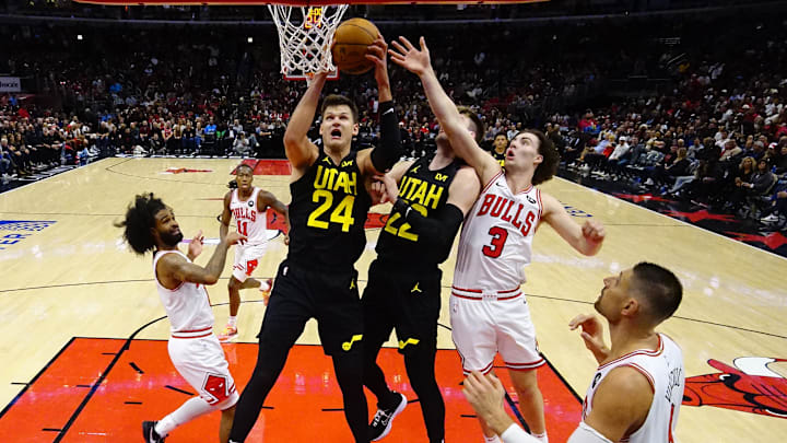 Nov 4, 2024; Chicago, Illinois, USA: Utah Jazz center Walker Kessler (24) grabs a rebound in front of Chicago Bulls guard Josh Giddey (3) during the first half at United Center. Mandatory Credit: David Banks-Imagn Images