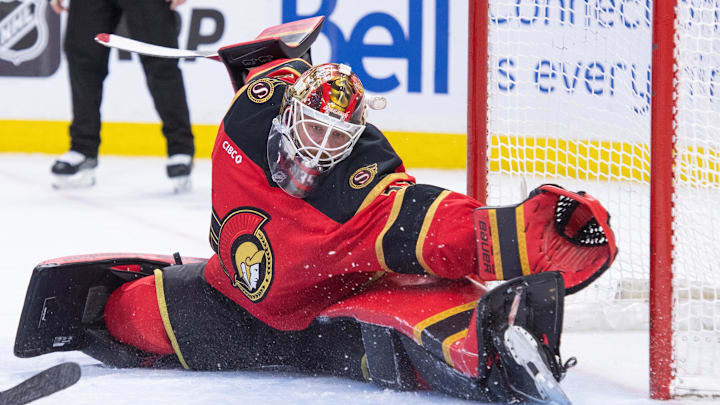 Mar 26, 2026; Ottawa, Ontario, CAN; Ottawa Senators goalie Linus Ullmark (35) reaches for the puck in the second period against the Pittsburgh Penguins at the Canadian Tire Centre. Mandatory Credit: Marc DesRosiers-IMAGN Images