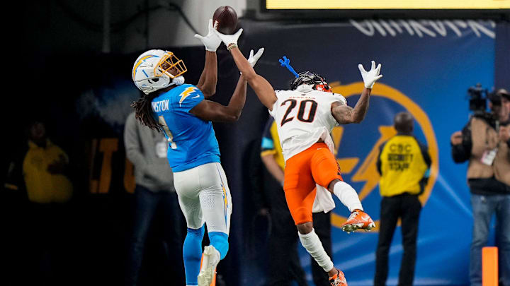 Cincinnati Bengals cornerback DJ Turner II (20) breaks up a deep pass intended for Los Angeles Chargers wide receiver Quentin Johnston (1) in the third quarter of the NFL Week 11 game between the Los Angeles Chargers and the Cincinnati Bengals at SoFi Stadium in Inglewood, Calif., on Sunday, Nov. 17, 2024. The Chargers won 34-27.