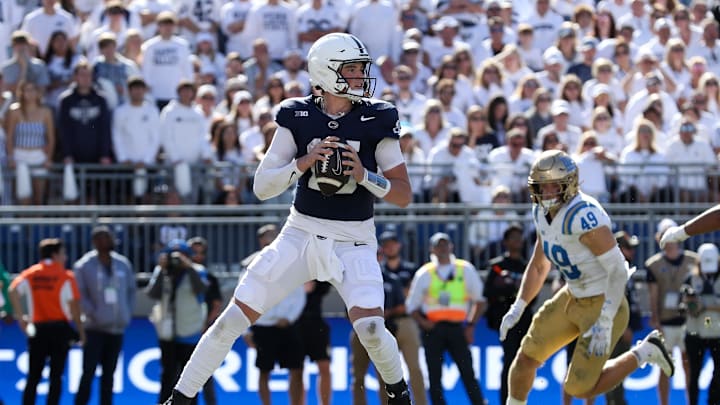 Penn State quarterback Drew Allar drops back in the pocket and looks to throw a pass during the fourth quarter against the UCLA Bruins at Beaver Stadium.