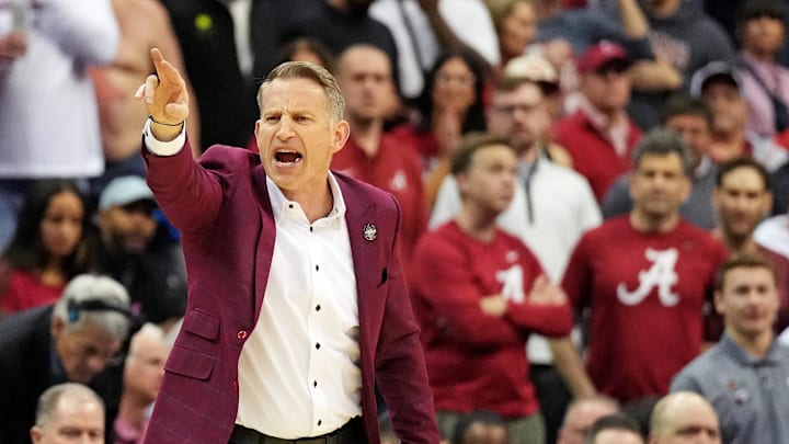 Mar 29, 2025; Newark, NJ, USA; Alabama Crimson Tide head coach Nate Oats calls to his team during the first half against the Duke Blue Devils in the East Regional final of the 2025 NCAA tournament at Prudential Center. Mandatory Credit: Robert Deutsch-Imagn Images Mar 29, 2025; Newark, NJ, USA; Alabama Crimson Tide head coach Nate Oats calls to his team during the first half against the Duke Blue Devils in the East Regional final of the 2025 NCAA tournament at Prudential Center. Mandatory Credit: Robert Deutsch-Imagn Images