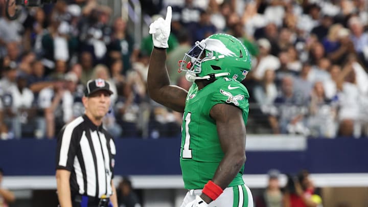 Nov 23, 2025; Arlington, Texas, USA; Philadelphia Eagles wide receiver AJ. Brown (11) celebrates a touchdown in the first quarter against the Dallas Cowboys  at AT&T Stadium. Mandatory Credit: Kevin Jairaj-Imagn Images