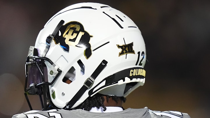 Oct 26, 2024; Boulder, Colorado, USA; Detailed view of the helmet of Colorado Buffaloes wide receiver Travis Hunter (12) during the first quarter against the Cincinnati Bearcats at Folsom Field. Mandatory Credit: Ron Chenoy-Imagn Images