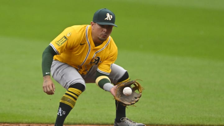 Jul 19, 2025; Cleveland, Ohio, USA; Athletics second baseman Luis Urias (17) fields a ground ball in the first inning against the Cleveland Guardians at Progressive Field. Mandatory Credit: David Richard-Imagn Images Jul 19, 2025; Cleveland, Ohio, USA; Athletics second baseman Luis Urias (17) fields a ground ball in the first inning against the Cleveland Guardians at Progressive Field. Mandatory Credit: David Richard-Imagn Images